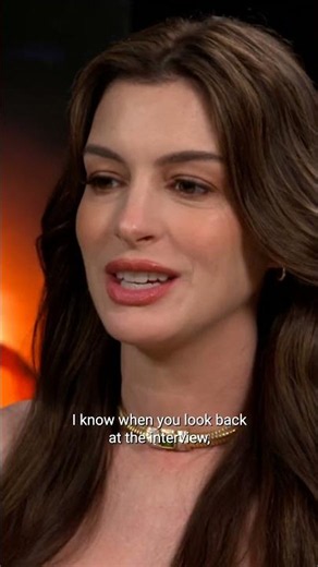 Anne Hathaway Fixes Host's Hair During THE ODYSSEY Interview