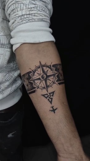 ABHISHEK KUSHWAH on Instagram: "“Compass Armband Tattoo – Guided by Direction, Defined by Art” “Not just a tattoo, a reminder 🧭 No matter where life takes you, always find your way back. Compass armband tattoo crafted with passion and precision.” Hashtags (use 5–8 for best reach): #CompassTattoo #ArmbandTattoo #TattooArtistIndia #tattoodesıgn"