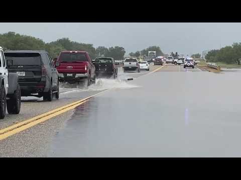 Flooding over Highway 90 caused hours of traffic delays as emergency responders battled high water
