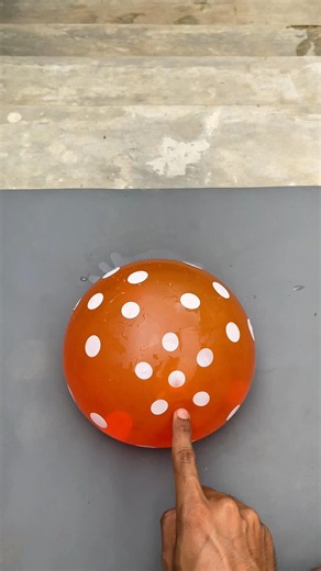Water Balloon Experiment: Dropping a polka dot balloon down the stairs—will it explode?