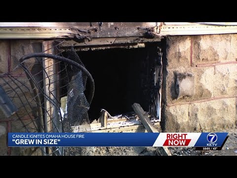 Candle ignites house in blaze, causes mayday call, injures firefighter