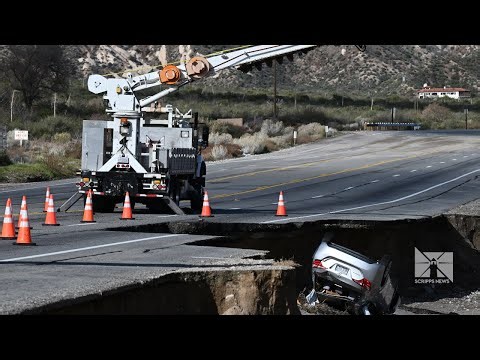 Winter storms across the US delay air travel, bring deadly floods