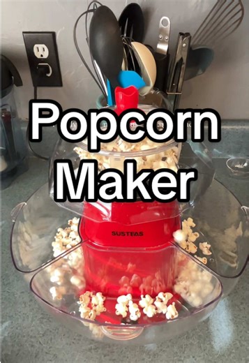 I love that this popcorn maker has 4 bowls so everyone can fix up their popcorn however they like!! #popcornmaker #movienight #familymovienight