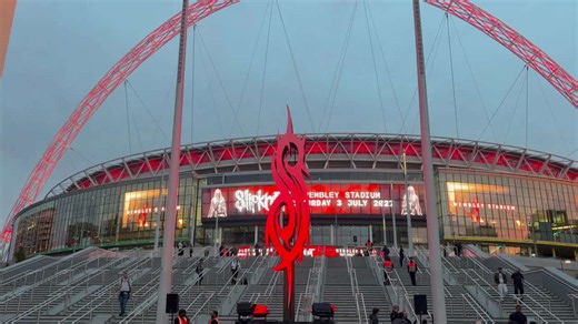 A giant 'S' is set on fire outside Wembley Stadium as metal icons Slipknot launch their 2027 stadium tour
