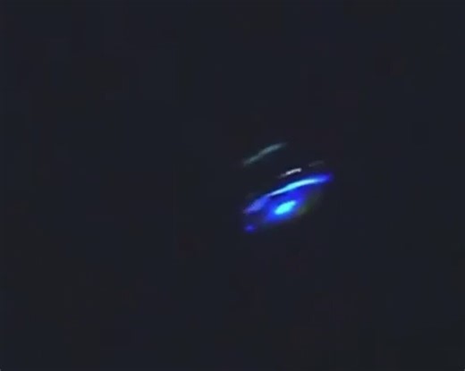 🚨 BREAKING: Alleged UFO filmed near Nellis Air Force Base on April 19, 2026 - and the footage is dividing investigators, analysts, and the internet.https://t.co/7Y1mPuUTIJA stabilized enhancement of the viral clip reveals a structured disc-shaped object with layered geometry, luminous blue perimeter lights, and apparent rotational symmetry hovering against the Nevada evening sky.What makes this case unusual:• Multiple independent reposts of the footage surfaced across X, Reddit, podcasts, and U