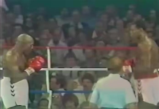 Larry Holmes 💪 vs. Earnie Shavers 🥊 – September 1979 Round 7: Holmes takes a devastating knockdown from one of the hardest punchers in history. But just like Tyson Fury vs. Deontay Wilder 40 years later, Holmes somehow gets back up… and goes on to win by TKO! ⚡ Proof that heart, grit, and determination define champions. 👑 #Boxing #LarryHolmes #EarnieShavers #TysonFury #DeontayWilder #Comeback #Knockdown #HardestPunchers #FightNight | BTR Boxing Podcast Network
