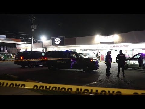 Woman shot during parking lot fight in SE Houston