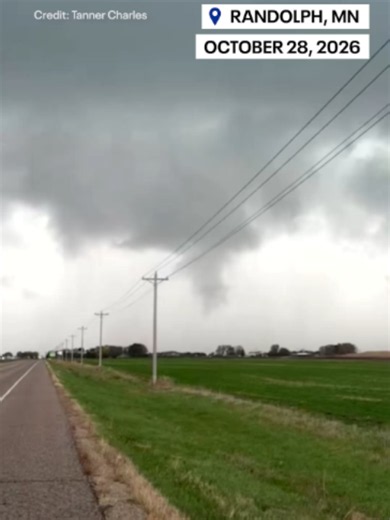 A funnel cloud was spotted near Randolph, Minnesota, Wednesday afternoon as strong storms moved through the area. Storm chaser Tanner Charles captured the dramatic scene while tracking the storm that prompted a tornado warning in Dakota County.