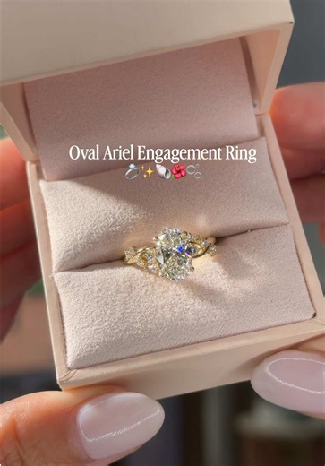 Would you say yes? 💍🫧 This unique oval engagement ring is so pretty even a mermaid would treasure it ✨ The band is crafted with wave-like gold contours & sea bubble side diamonds, creating the most romantic and ethereal setting. It’s hard not to fall in love with a piece as stunning as this one 💕 Full Ring Details – save for reference ✨ • Setting: Ariel • Band Width: 1.6mm • Metal Type: 14kt Yellow Gold • Center Stone: Oval Lab Diamond • Carat: 2.03ct | Color: E | Clarity: VS1 • Price: $3,834