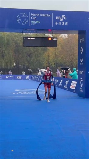 Max Studer🇨🇭takes the tape at the Beijing World Cup! #BeijingWC #Triathlon