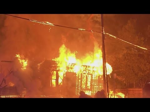 Fire in SE Portland engulfs home as downed power lines impede firefighters