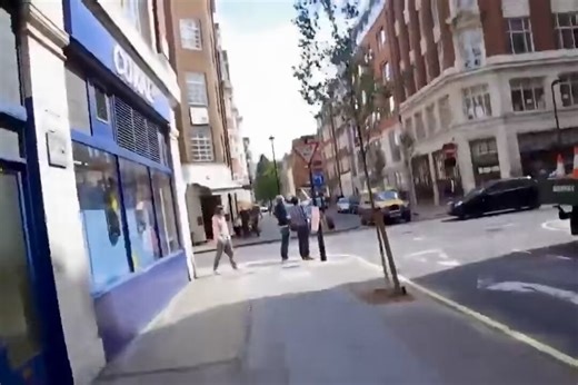 Mass UFO Sighting in Broad Daylight Over London in June 2011 🛸👽On a sunny afternoon in central London, pedestrians suddenly stopped in the streets, heads tilted up, phones out, filming something unusual in the sky.This raw footage shows multiple bright objects moving quickly across the clouds, darting, changing direction, and appearing in a loose formation. No visible wings, no contrails, just fast-moving lights that drew an instant crowd.People on both sides of the street froze and pointed. S