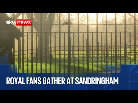 Fans gather to catch a glimpse of the Royals attending a Christmas service in Sandringham