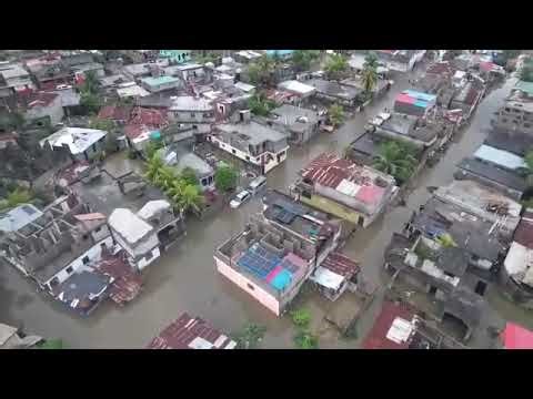Floodwaters devastate homes, crops in Northwestern Haiti, at least 12 dead.