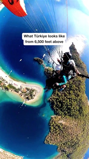 Paragliding in Türkiye is one of the most iconic ways to see the coastline from above. 🪂🇹🇷 Launching from Mount Babadağ over Ölüdeniz, you float thousands of feet above turquoise water, white-sand beaches, and dramatic cliffs. Flights last around 30–45 minutes and are tandem, making it accessible even if you’ve never flown before. Calm thermals, steady winds, and unreal views make this one of the best paragliding spots in the world. 🎥 IG @cantravelwilltravel #VisitTurkey #ParaglidingTurkey #