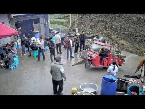 Loaded e-bike tips upward while climbing slope in Guizhou, China