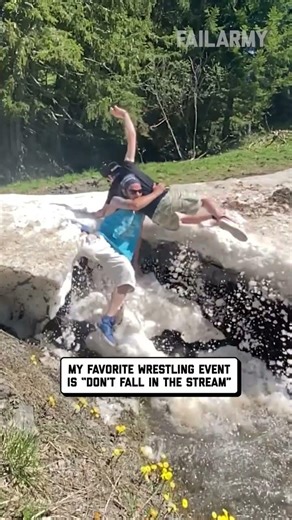 Guy Falls Into Stream While Trying To Throw Friend Into It