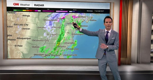 Sprawling storm drops feet of snow, knocks out power with high winds and disrupts thousands of flights