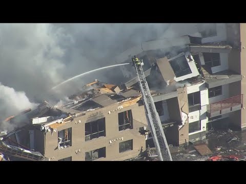 Raw aerial footage: Firefighting continues at Denver apartment building construction site