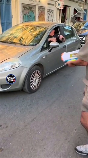 Young second-generation and third-generation migrants “help” French people to cool down on the streets of Paris during the ongoing heatwave.Some of the Parisians are upset with the damages caused to their cars though.