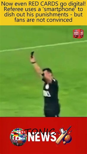 Now even RED CARDS go digital! The referee uses a 'smartphone' to dish out his punishments