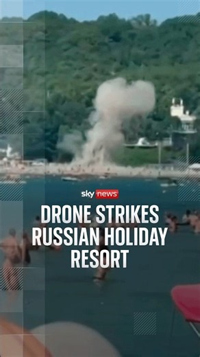 Beach crowds watch as drone strikes Russian holiday resort