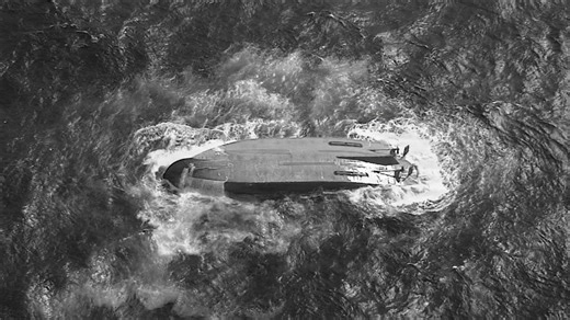 Search suspended for missing crew of ship that overturned near during typhoon