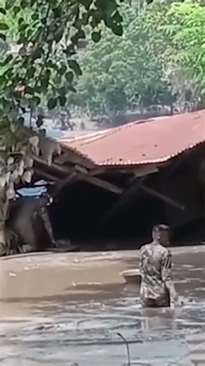 Nepali soldier carries mud-covered citizen to safety after deadly flash-flood #shorts