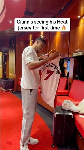 Giannis holding Heat jersey for first time 🍿🔥