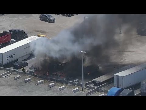 Multiple vehicles seen burning in northwest Miami-Dade