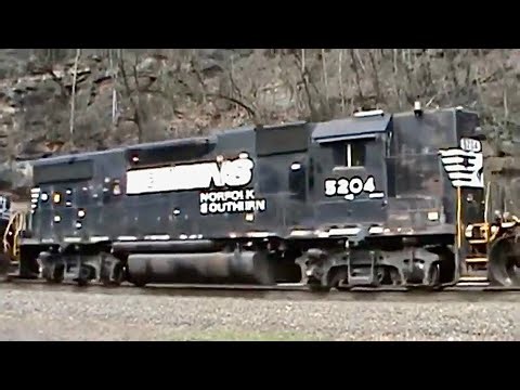 Norfolk Southern high hood GP38-2 ex Southern with a beat up ex Conrail SD40-2 trailing older video