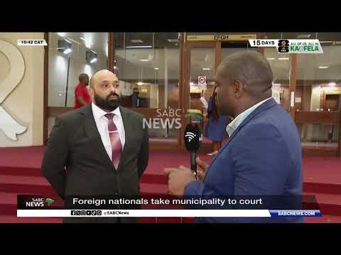 Foreign nationals take municipality to court
