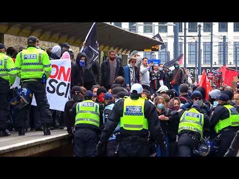 Arrests made as counter-protesters clash with police in Manchester during Britain First march