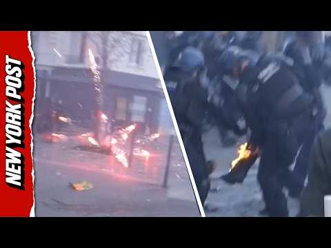 Police Catching On Fire as Rioters Aim Fireworks At Them