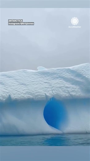 Iceberg Transforms into Blue Ice Cave in Antarctica