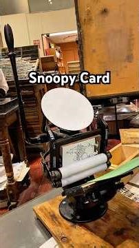 Printing a Snoopy Christmas card with a tabletop printing press