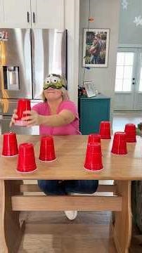 Blindfold stacking challenge! Stack the 12 cups blindfolded faster than the other person!