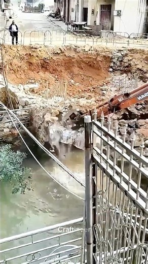 OMG! Excavator Demolition Goes Wrong — Falls Straight into the Water! 🌉