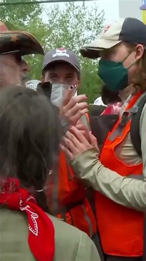 Armed ICE supporter confronts protesters after fatal Maine shooting