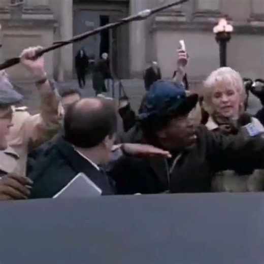 Gambino boss John Gotti Sr. after one of his trials / Armand Assante in "Gotti" (1996).
