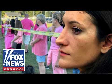 HUNDREDS rally in support of mom accused of murdering her children