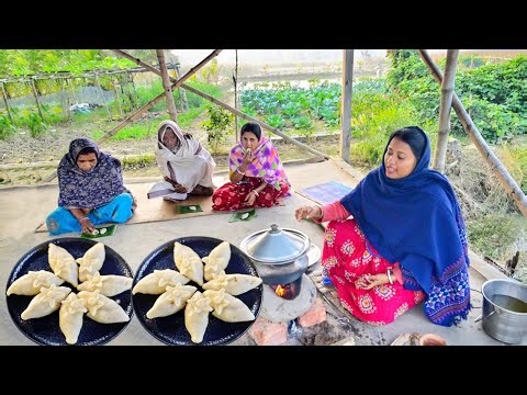 কনকনে এই শীতে গরম গরম রসে ভরা ভাপা পিঠা, একবার খেলে আবার চাইবে