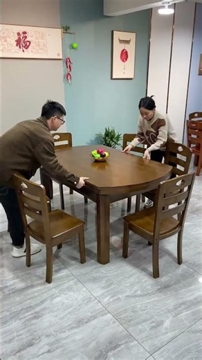This is a solid wood extendable round dining table set with chairs.dj