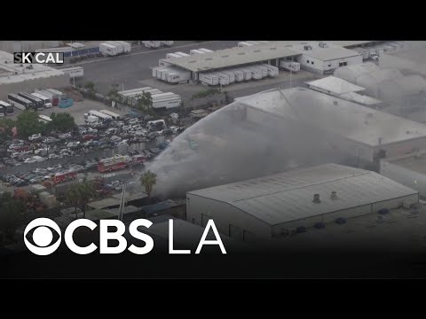 Los Angeles firefighters battle blaze at Pacoima auto salvage yard