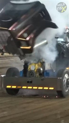 The Craziest Truck Engine Explosion! 💥🚛 What you’re seeing here is one of the wildest moments ever caught at a tractor and truck pulling event. During a full-throttle run, the engine catastrophically failed and literally exploded, sending massive engine parts flying in a split second. These engines are pushed far beyond normal limits, producing extreme power—and when something goes wrong, it goes very wrong. 🛡️ Why the driver survived The driver walked away because of engine safety cables. Th