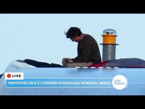 Live: Protester on Washington DC's Frederick Douglass Memorial Bridge continues
