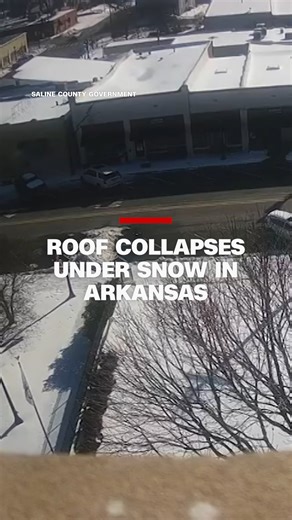 Security camera footage from the Saline County Courthouse shows the roof of a building collapse from apparent snow buildup. No injuries or fatalities were reported, according to the county government's Facebook page. | CNN