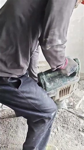 Controlled Concrete Floor Demolition with Power Drill Tool