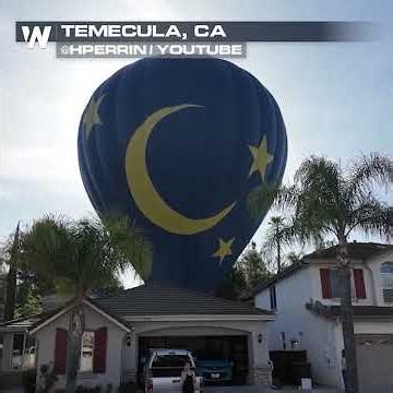 HOT AIR BALLOON LANDS IN BACKYARD