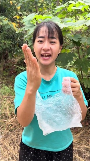 Put a plastic bag over your hand when eating candy so it doesn't get sticky #bushcraft #shorts